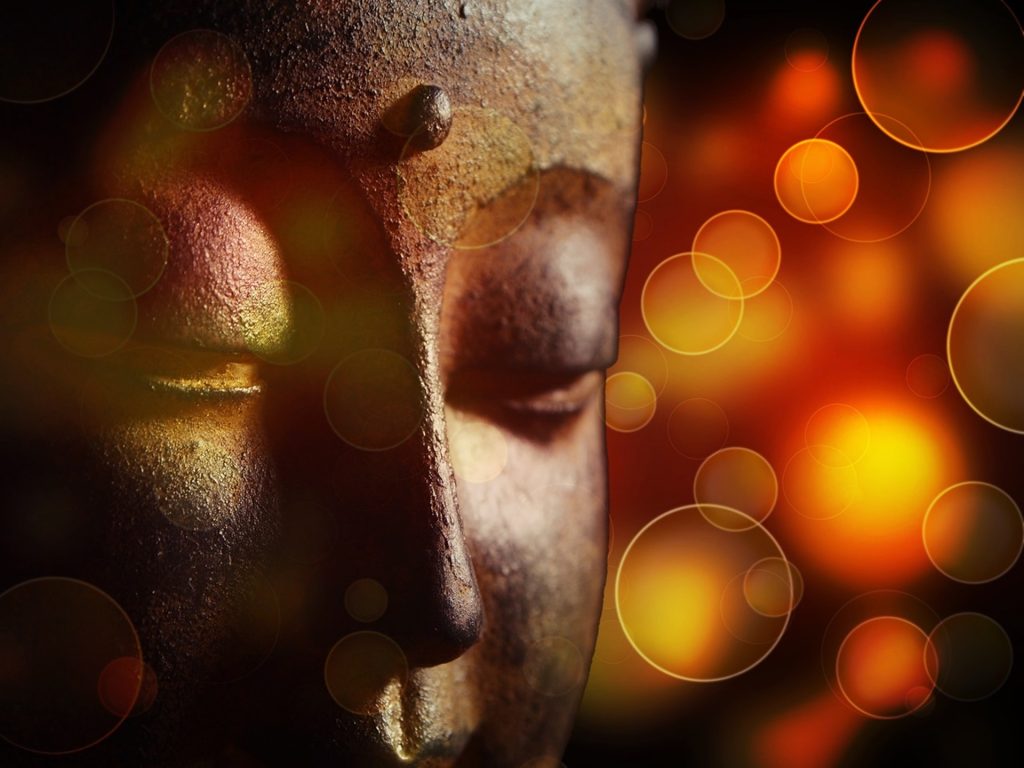 Visage sculpté d'un moine indien